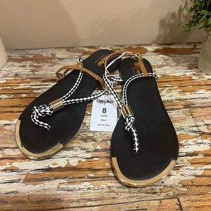 Missimo brand new w tags black and white harlequin flip flops / thongs. Woman’s